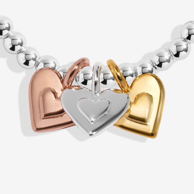 Trio heart charms in silver, gold and rose gold plating
