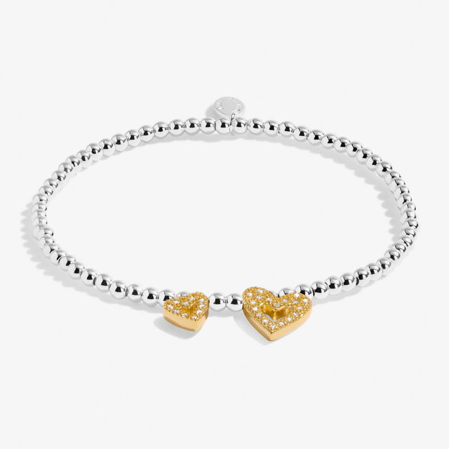 Silver beaded bracelet for daughter with gold heart charms