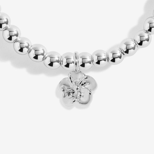 Flower charm detail on Wonderful Mum silver bracelet