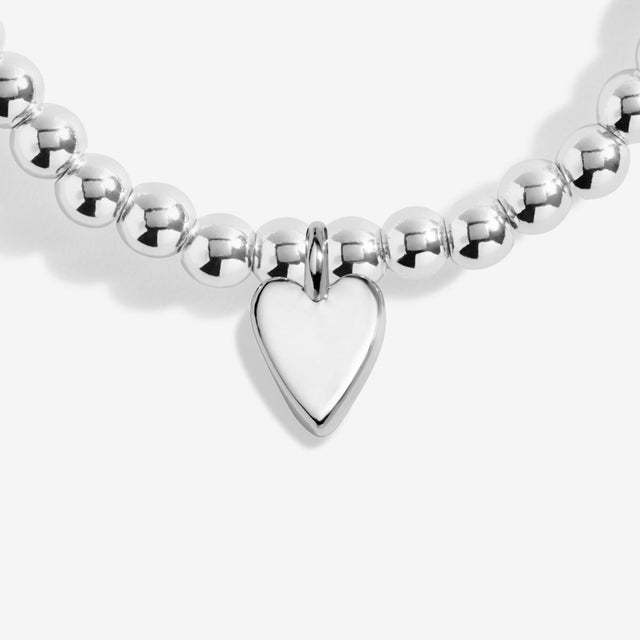Solid silver heart charm on Wonderful Mum charm bracelet