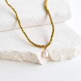 Detail of Kiki Golden Mirage crystal jewellery beads and pendant charm