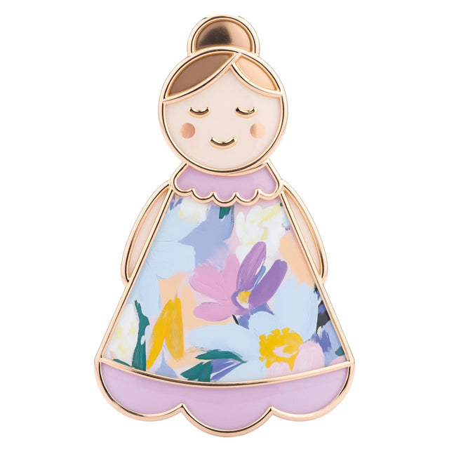 Close up of Lucky Little Ladies Nanna enamel pin badge keepsake gift with floral dress design and rose gold finish.