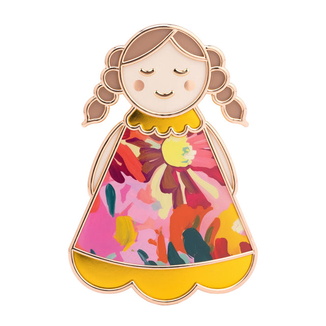 Close up of Lucky Little Ladies Special enamel pin badge keepsake gift with colourful floral design.
