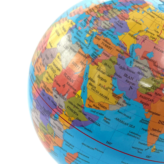 Mini earth globe with travel tracker stickers for planning adventures