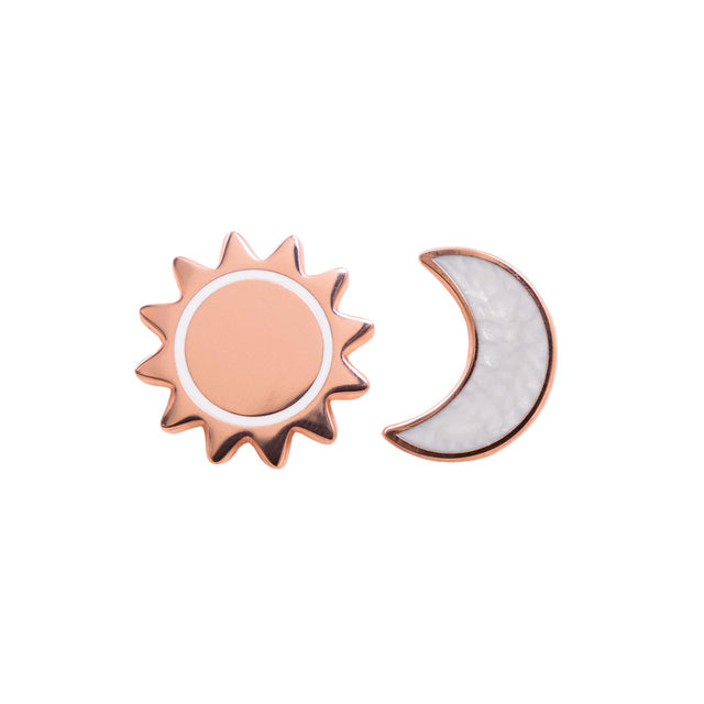 Close-up of Splosh Mum and Daughter sun and moon matching keepsake pins.