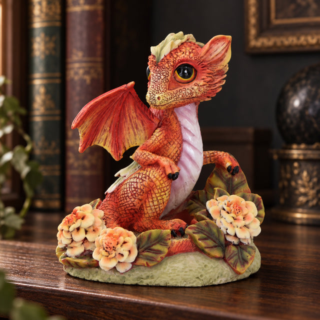 Nemesis Now Marigold Flower Dragon Figurine — 11cm displayed in a dark gothic setting