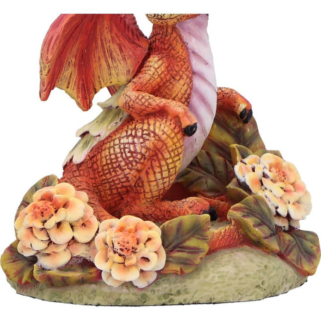 Nemesis Now Marigold Flower Dragon Figurine — close-up of marigold flowers and the textured base