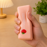 Pink Strawberry Milk Bar slow-rise squishy toy for sensory play and fidgeting