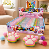 Rainbow Cat Paw Squishy Fidget Toy with fluffy attached pom pom bobbles