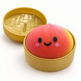 Rainbow Dumpling squishy toy in included basket