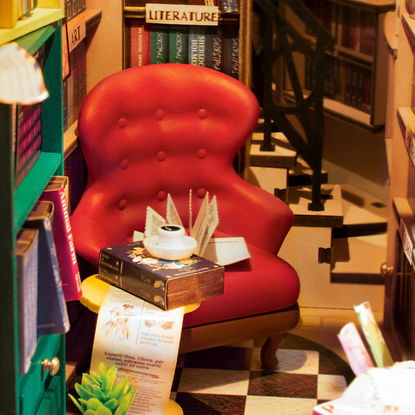 Miniature bookstore book nook with sofa and bookshelves