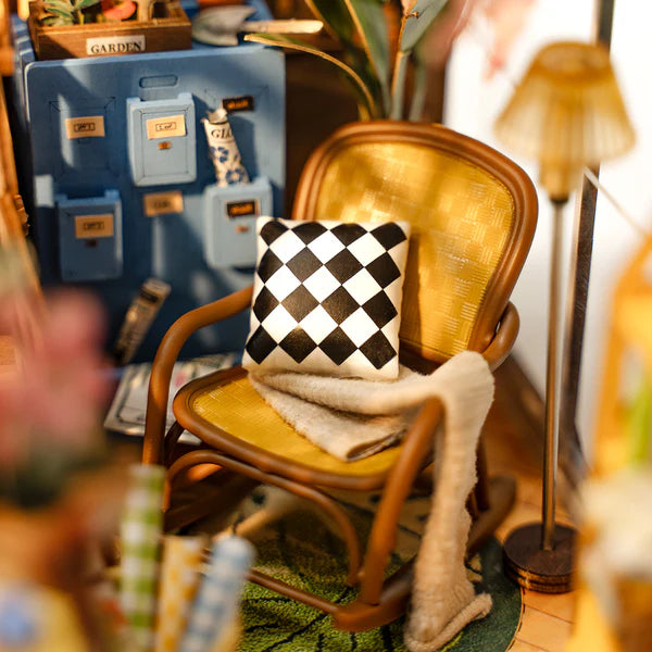 Garden house miniature book nook with flowers and lighting