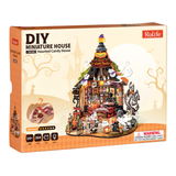 Angled view of the Robotime Rolife Haunted Candy House DG186 DIY miniature house kit box