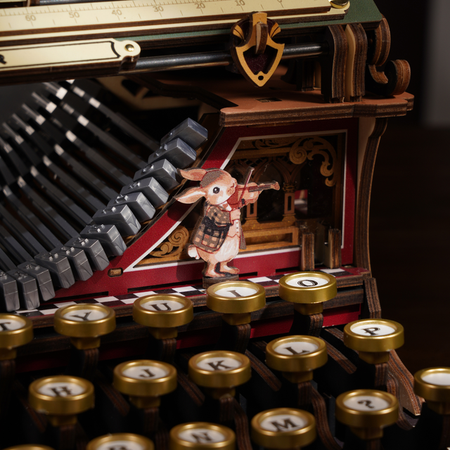 ROKR wooden mechanical typewriter ribbon spool and paper roller detail