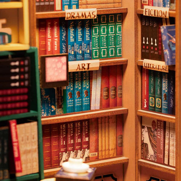 Miniature bookstore book nook with sofa and bookshelves