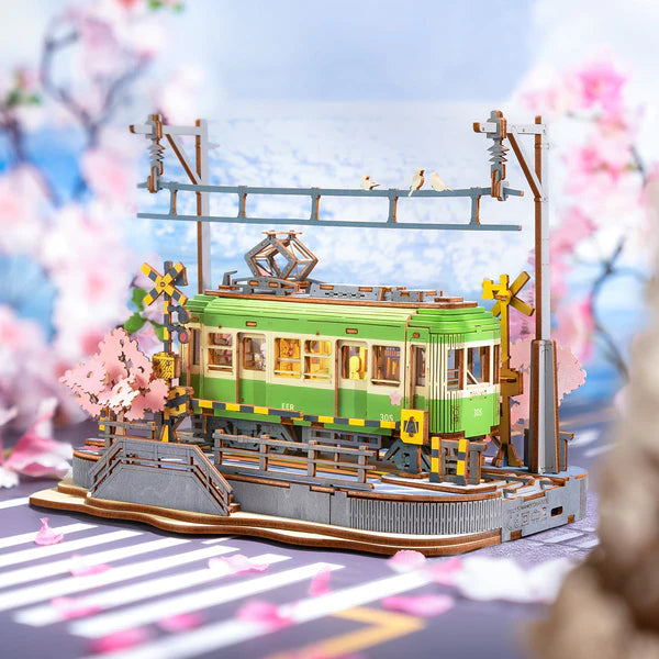 Fully assembled Rolife Sakura Journey 3D puzzle showing detailed Japanese tram and station scene