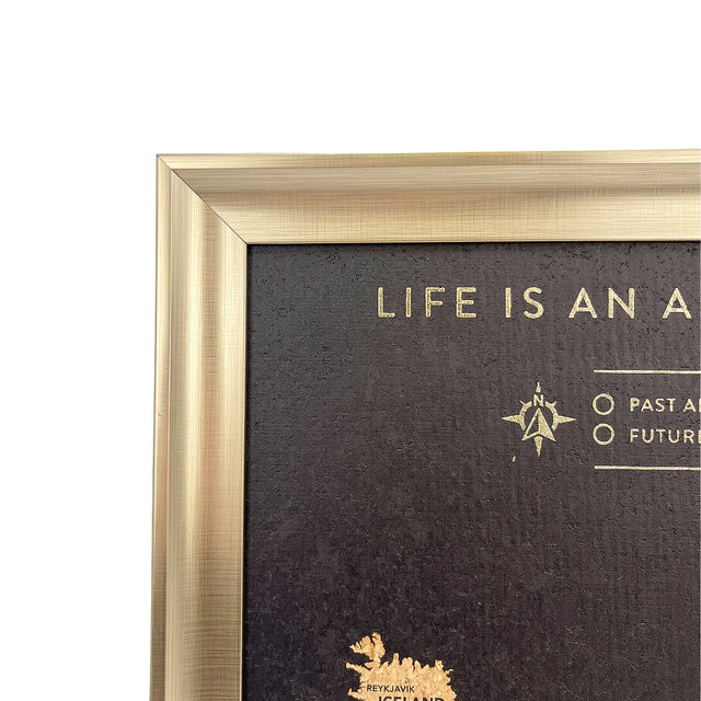Close-up of the gold frame and top of the Splosh black Europe travel map
