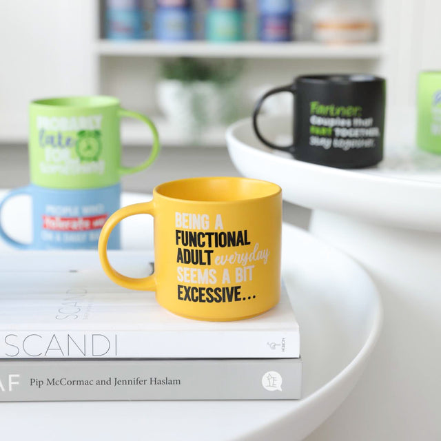 Funny Splosh Cheeky Mugs on a table – witty and colourful mugs perfect for work or gifting.