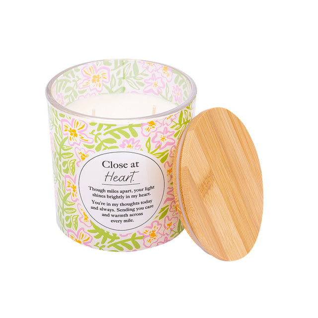 Splosh Close At Heart 340g scented candle with pink green and yellow floral design