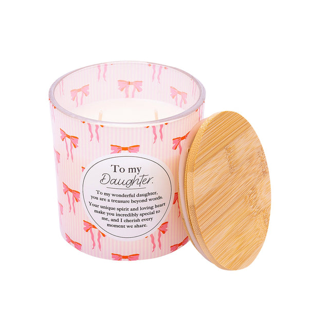 Splosh Daughter 340g scented candle with pink striped bow design