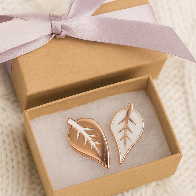 Splosh Family Keepsake Pins displayed in a gift box with ribbon