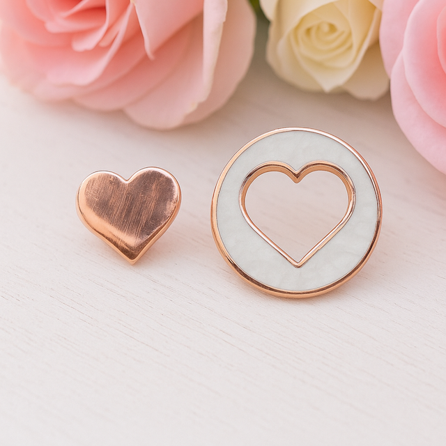 Forever Connected Heart Keepsake Pins styled with flowers in a flatlay