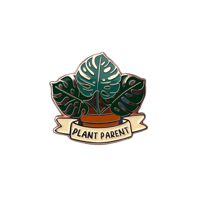 Front view of Splosh Plant Lover enamel pin showing leaf and banner detail