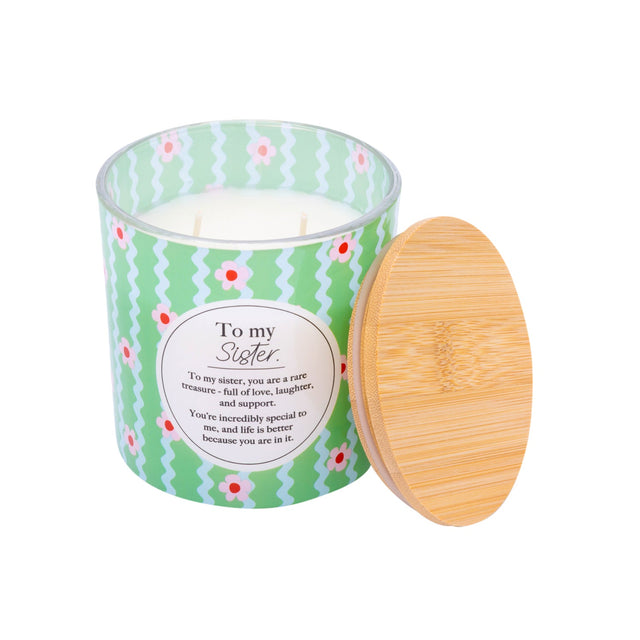 Splosh Sister 340g scented candle with green floral design