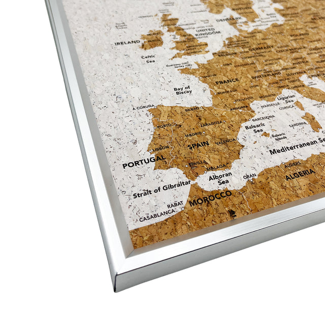 Close-up of European destinations and cork detail on the Splosh white map with silver frame