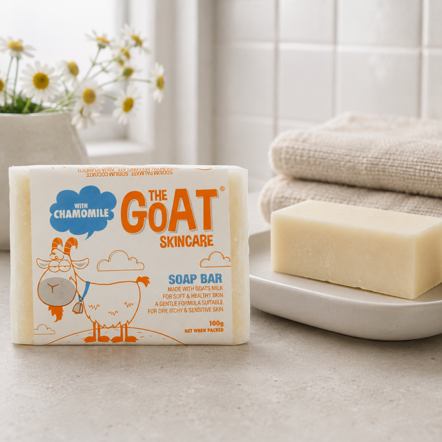 The Goat Skincare Chamomile goat milk soap bar displayed in a bathroom