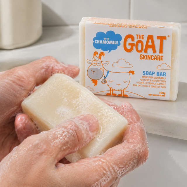The Goat Skincare goats milk soap bar creating a creamy lather during washing