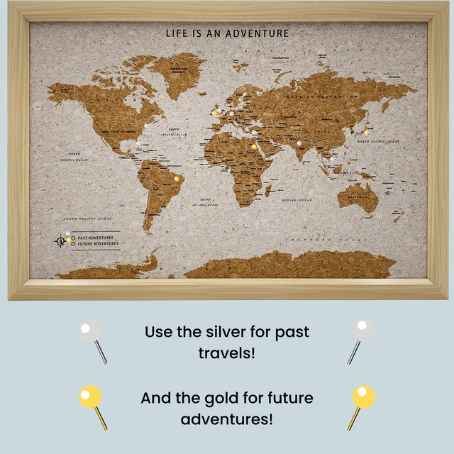 World travel map cork board with gold and silver push pins usage
