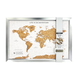 White world travel map cork board with silver frame and push pins by Splosh for tracking global travel