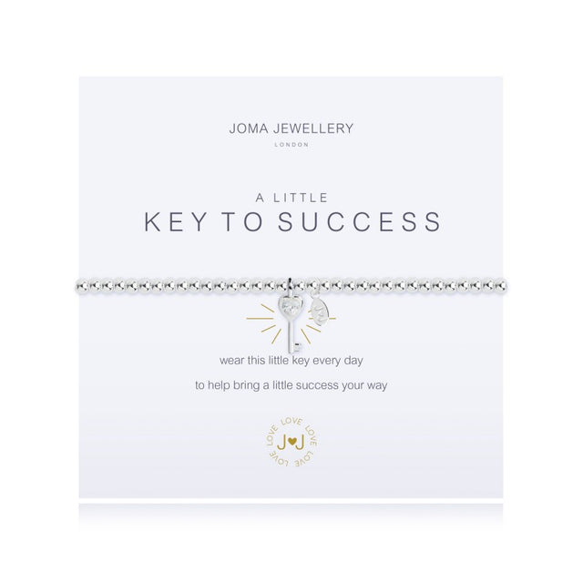 Wear this little key every day to help bring a little success your way.