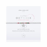 This ones for the October girls, whether youre treating yourself or someone you love! Our lovely October A Little Birthstone Bracelet radiates beauty with real semi-precious Tourmaline gemstones and a gently hammered silver star charm. Thanks to our signature stretch bead design, this silver-plated treasure provides a perfect fit now and forever.