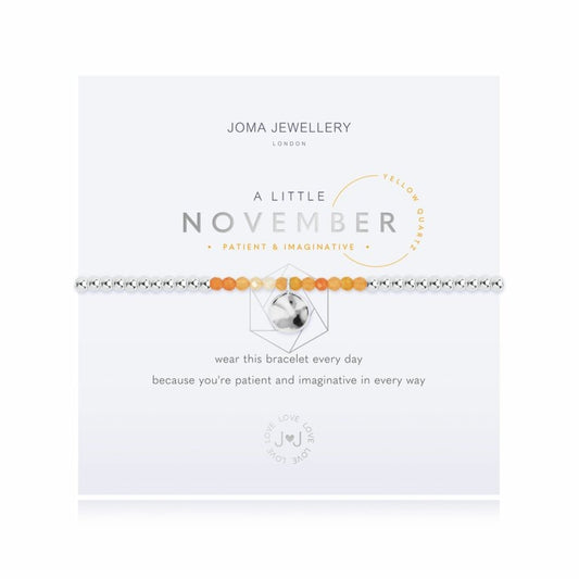 For all November babies, our lovely A Little Joma bracelet radiates birthstone beauty with special yellow quartz stones and a gently hammered silver circle charm.