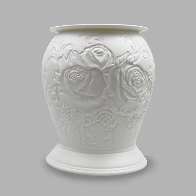 The porcelain material of this English Garden themed Wax Burner allows bright light to shine through it, providing the opportunity to create this gorgeous design. This is done by crafting images out of thicker and thinner sections of the porcelain, allowing for detailed shadowing and a 3D effect. The porcelains elegant look will fit perfectly in any room is available in a range of designs and two different shapes.