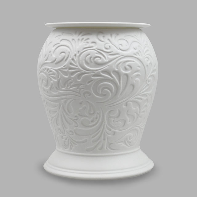 The porcelain material on this Wax Melt Burner allows bright light to shine through it, providing the opportunity to create this gorgeous Swirl design. This is done by crafting images out of thicker and thinner sections of the porcelain, allowing for detailed shadowing and a 3D effect. The porcelains elegant look will fit perfectly in any room is available in a range of designs and two different shapes.