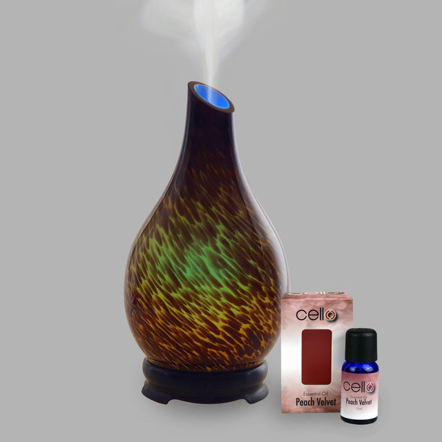 The dark background of this essential oil diffuser allows striking green and yellow to create an explosion of colour making it the perfect diffuser for any room. 