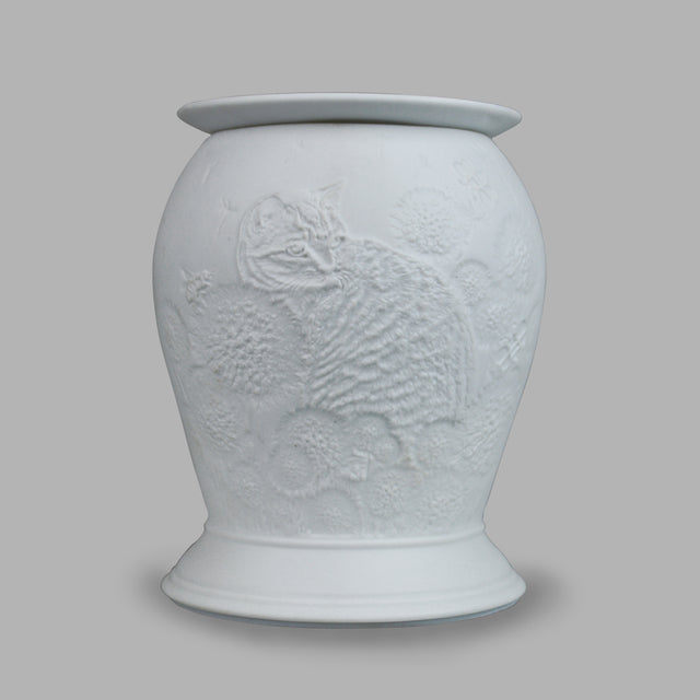 The porcelain material of this Cat themed Wax Burner allows bright light to shine through it, providing the opportunity to create this gorgeous design. This is done by crafting images out of thicker and thinner sections of the porcelain, allowing for detailed shadowing and a 3D effect. The porcelains elegant look will fit perfectly in any room is available in a range of designs and two different shapes
