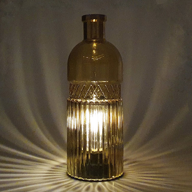 This charming amber large lamp compliments the vintage design well, the effortless glass pattern is eye catching when lit  