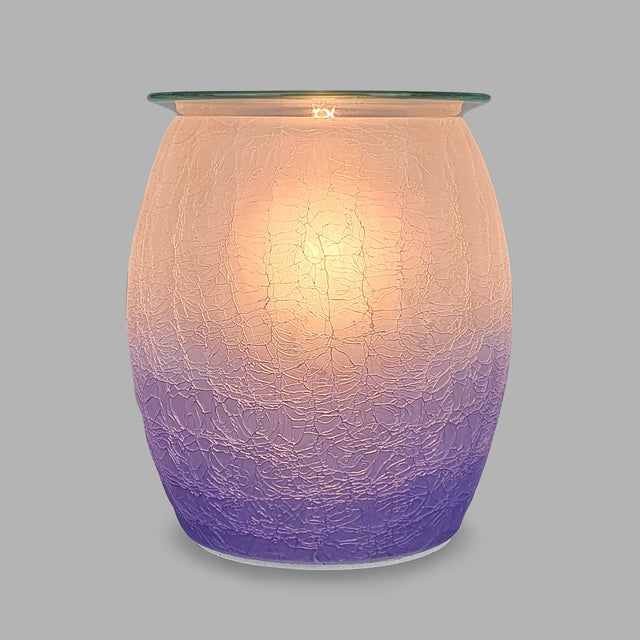This Wax Melt Burner is designed with a striking purple crackle pattern that gives an elegant feeling to any room. The Ombre colour perfectly complements the crackle; making it look beautiful even when unlit. When turned on, the bright light shines through like a sunset, emphasizing the gorgeous colours.
