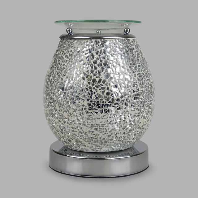 This Melt Burner features touch technology, giving you three different light/heat levels to allow you to create your desired atmosphere. The bulb will shine through the beautiful silver mosaic creating a gorgeous show of light.
