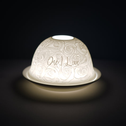 Cello porcelain tealight holder dome, in our one I love design. This design displays the text one I love over endless roses. We offer a wide range of porcelain tealight holders to let you choose your show stopping piece and show it off with pride when guests and family are over.  Pick your preferred option between LED lights or using tealight candles.