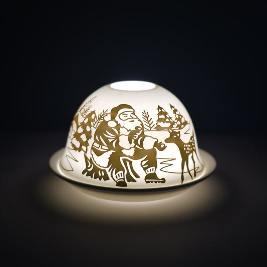 Cello porcelain tealight holder dome, in our father Christmas design. This design displays father Christmas in gold outside with the snow. We offer a wide range of porcelain tealight holders to let you choose your show stopping piece and show it off with pride when guests and family are over.  Pick your preferred option between LED lights or using tealight candles. 