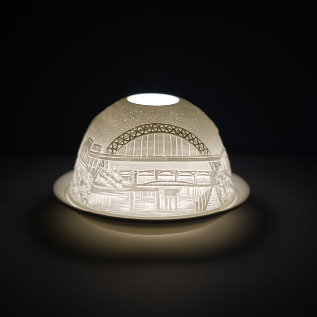 Cello porcelain tealight holder dome, in our north east design. This design displays a some of the iconic sites in the North East of England. We offer a wide range of porcelain tealight holders to let you choose your show stopping piece and show it off with pride when guests and family are over. Pick your preferred option between LED lights or using tealight candles.