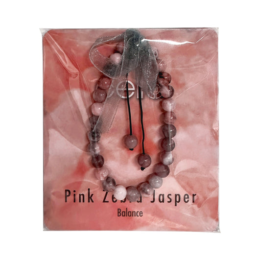 Wear this bracelet to feel the benefits of your gemstone. Bring balance, harmony, and positivity into your life with this stone. The black and white of this stone calls back to Ying & Yang, we
need the ups and the downs in our lives. The pink inspires a positive outlook and deeper emotional connections.