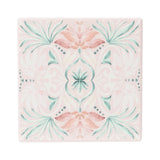 Printed ceramic coaster with embossed pink floral detail and cork backing