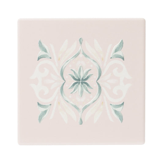 Printed ceramic coaster with embossed flourish detail and cork backing