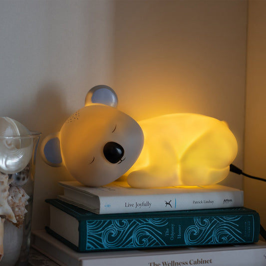 Sleeping Koala-shaped blue night light. These newest Night Lights are set to be an incredible decor addition to any little ones room and an amazing gift idea for all occasions - birthdays, christenings, holidays, and just because! 